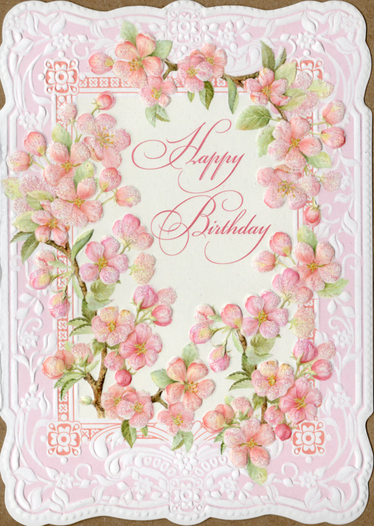 Delicate pink cherry blossoms on white embossed die cut general birthday greeting card by Carol Wilson. Inside: Lovely wishes for a wonderful day! Retail $4.25 | CRG6019 | 255423