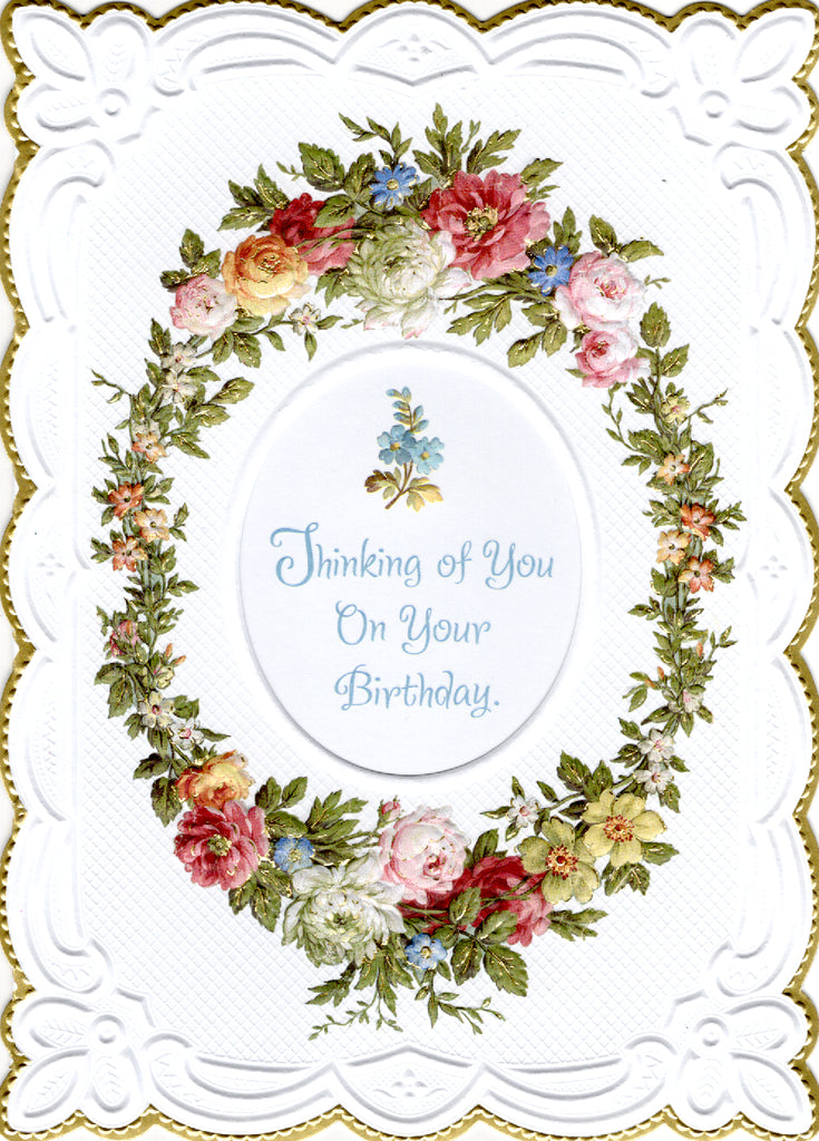 Floral wreath Thinking of you on your birthday embossed die cut general birthday greeting card by Carol Wilson. Inside:...and wishing you the happiest kind of day! Retail $4.25. | CRG1555 | 255650