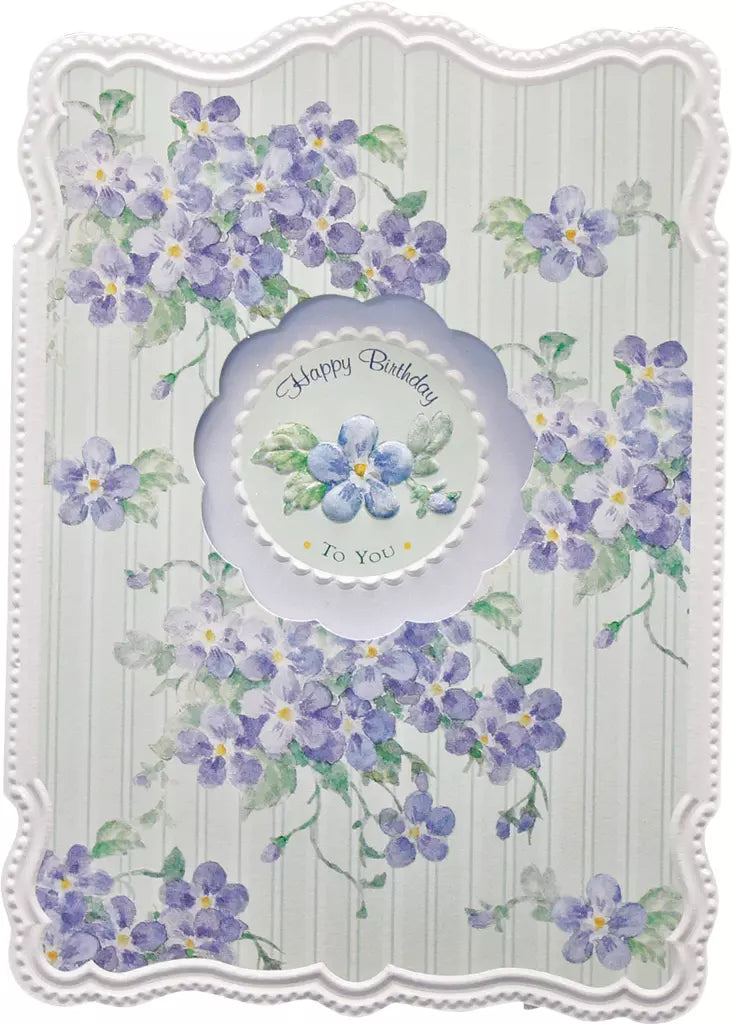 Blooming violets on a green white striped background embossed die cut general birthday greeting card by Carol Wilson Inside May your birthday be as special as you are. Retail 4.25 255073 CRG1352