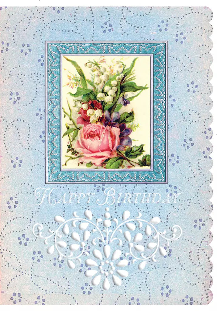 Mauve roses on a blue background embossed die cut birthday greeting card  by Carol Wilson. Inside: A wish for your birthday joy and laughter and dreams come true. Retail $4.25  255587 CG4024