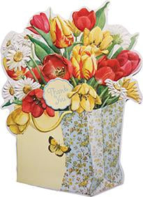 Pretty gift bag filled with red and yellow tulips. Thank you card from Carol Wilson Fine Arts. Inside: From the bottom of my heart! Retail: $4.25 f 6 CRG1655